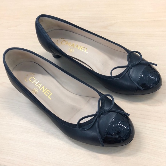 black chanel slip ons